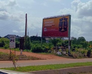 (Photos) ‘All Eyes On The Judiciary’ Billboard Spotted In Benin