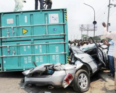 BREAKING: Another container falls on Ogun road, crushes vehicle